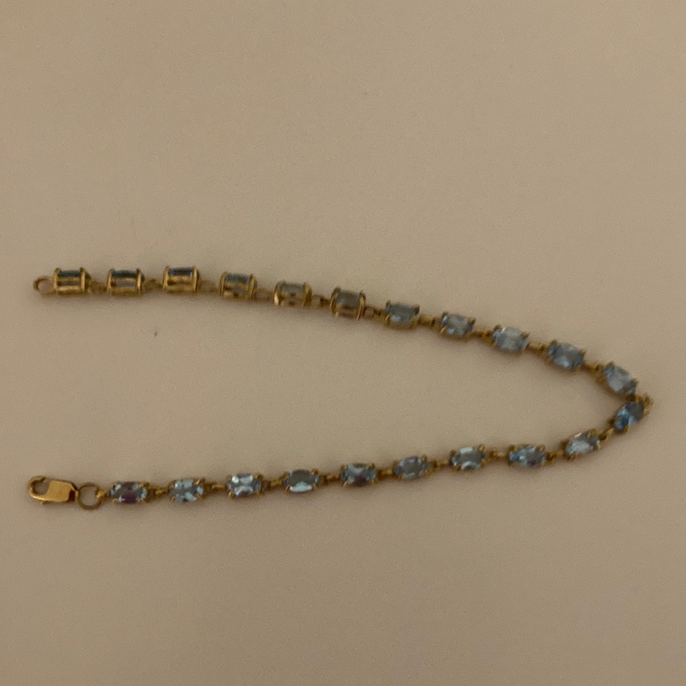 Elegant Gold and Blue Bracelet